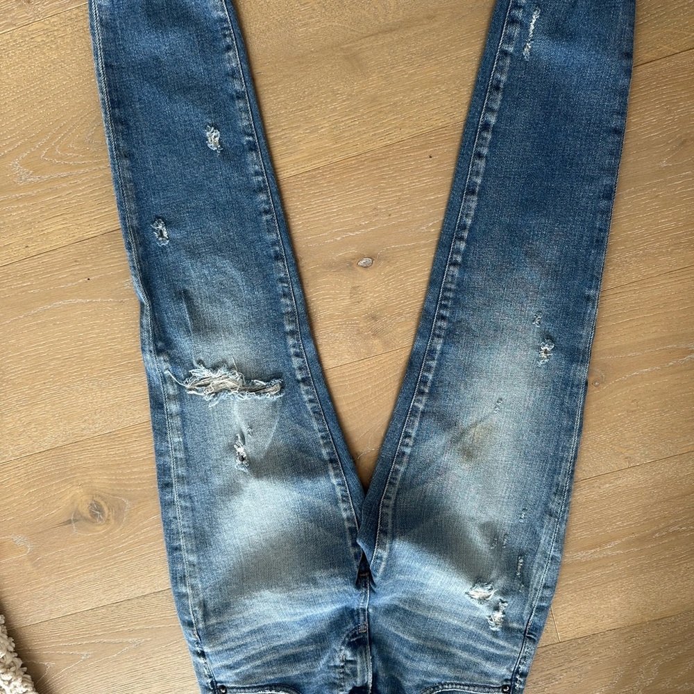 Distressed Blue Jeans